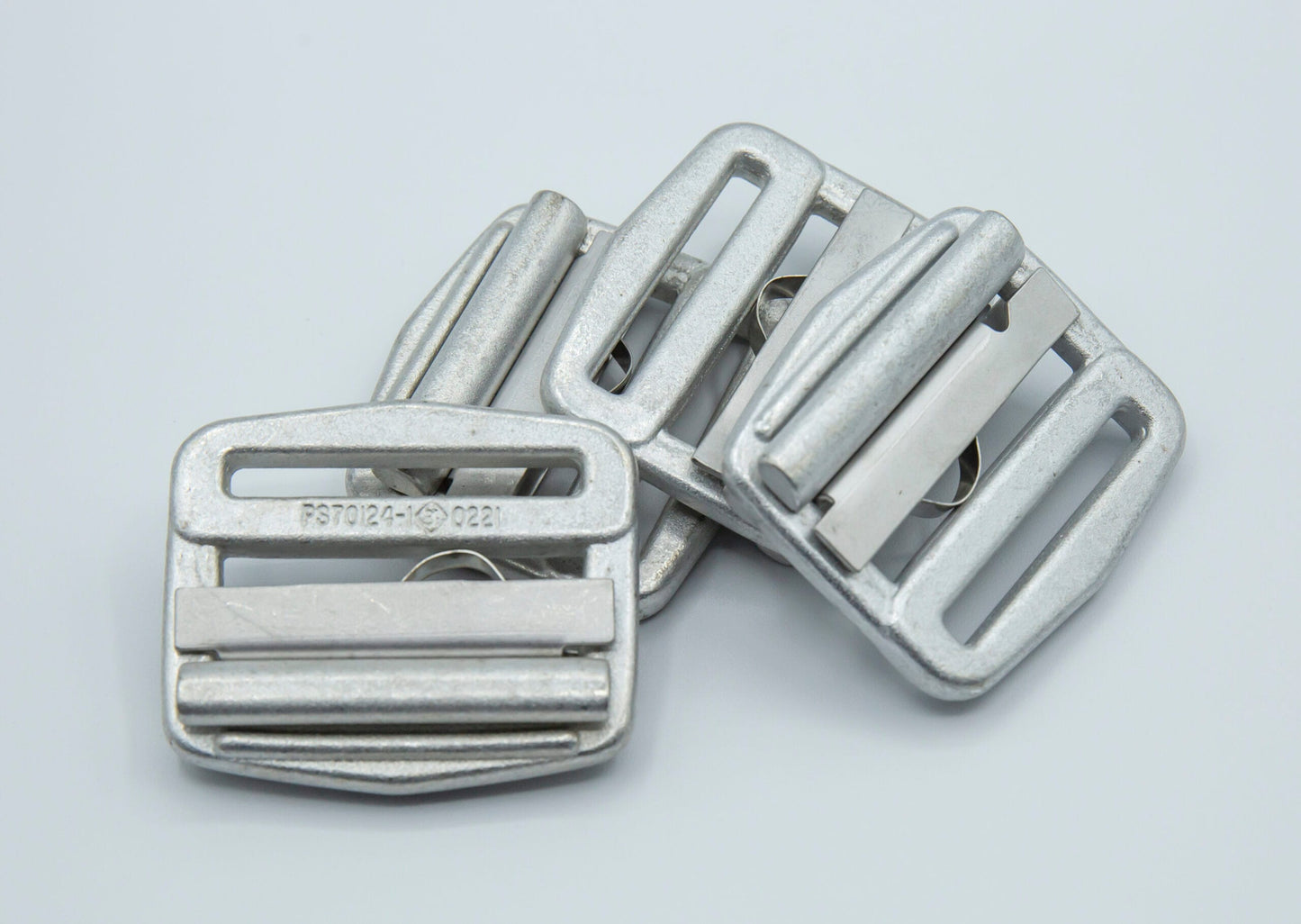 Adjustable buckle with spring